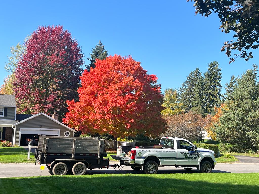 Benson Enterprises truck by vibrant fall trees