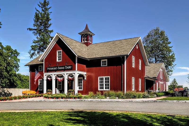 Pittsford Farms Dairy in a classic red barn building.